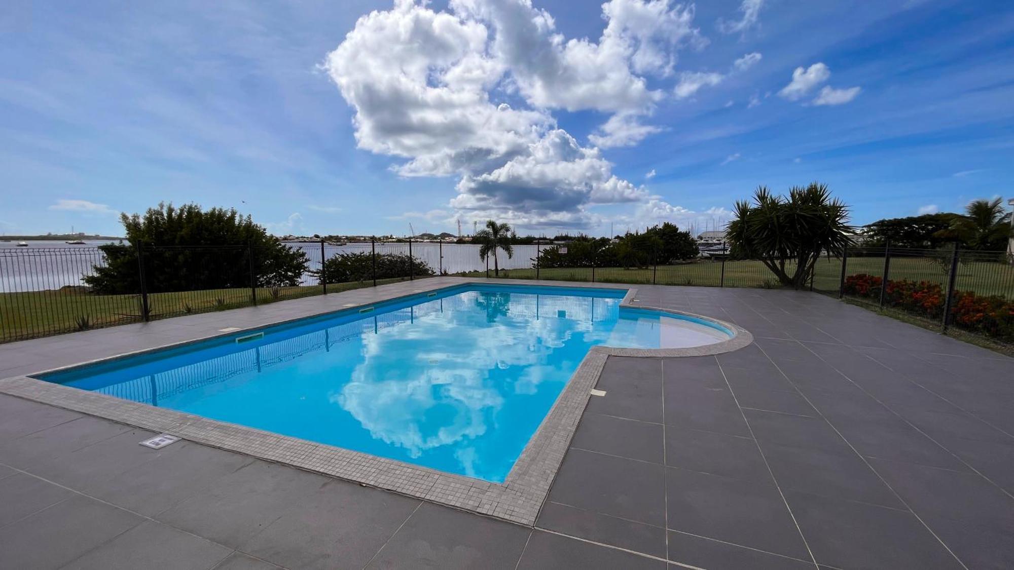 Le Sea-Breeze - Beau Studio Piscine Vue Lagon Marigot  Buitenkant foto